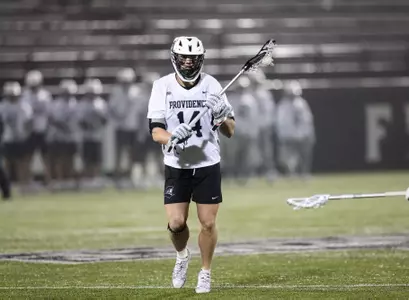 Dean Metzger with the ball in 2024 home game on Chapey Field in Anderson Stadium