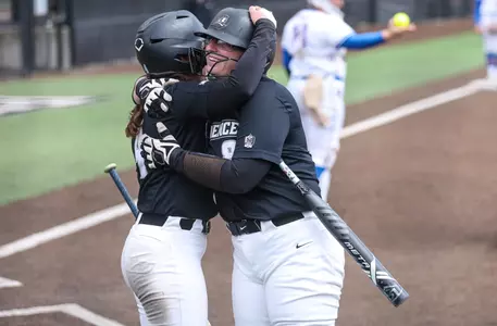 Tori Grifone Celebratory hug softball