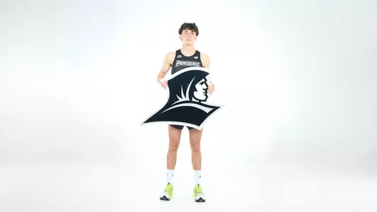 Elliott Pugh Posing with Friar Logo