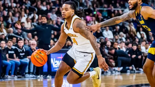 Mens basketball player Corey Floyd Jr Action Shot on court 2025