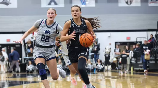 Kylee Sheppard - women's basketball action photo