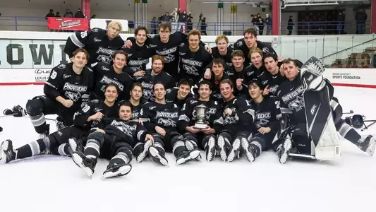Providence College Men's Ice Hockey Team group photo on the ice after Mayor's Cup win against Brown
