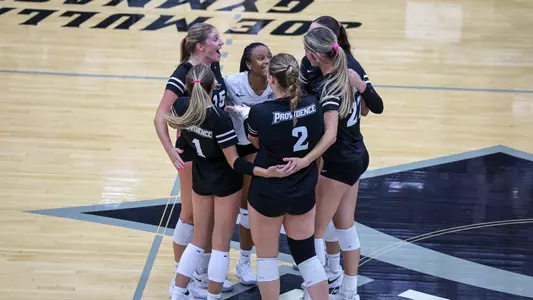 Volleybal Team Huddle at Alumni Hall in Providence, R.I. during a non-conference match against New Haven.