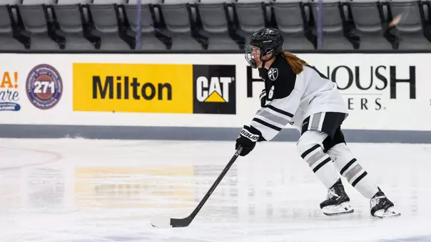 Women's ice hockey player Audrey Knapp on the ice at Schneider Arena