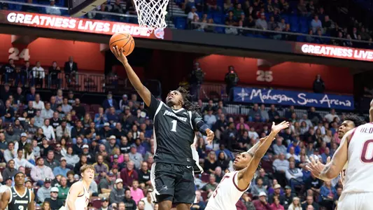 Jason Edwards floats a layup around a defender versus Virginia Tech at Mohegan Sun
