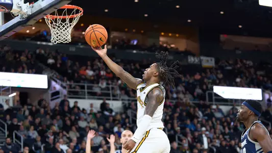 Jason Edwards floats a layup versus the University of New Hampshire