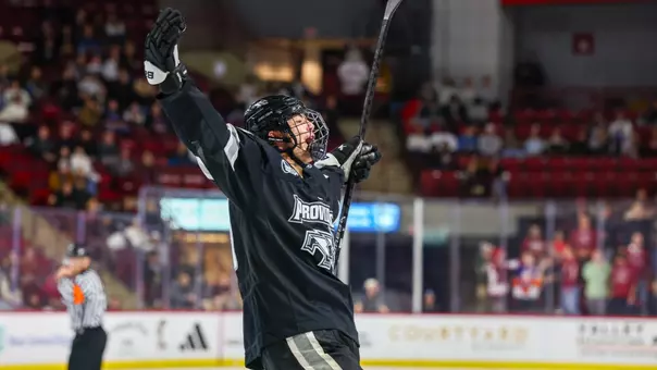 Men's Hockey's Roger McQueen celebrates a goal at UMass