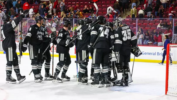 Men's Hockey team celebrates win at UMass