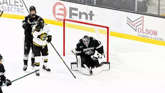 Men's Hockey's Philip Svedeback makes a save at Colorado College.