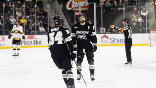 Men's Hockey's Hudson Malinoski celebrates a goal against Colorado College