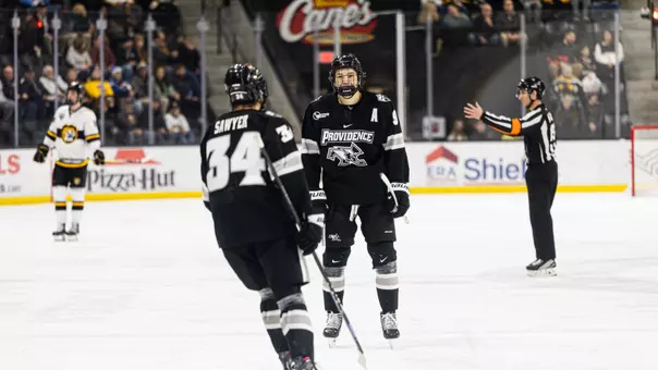 Men's Hockey's Hudson Malinoski celebrates a goal against Colorado College