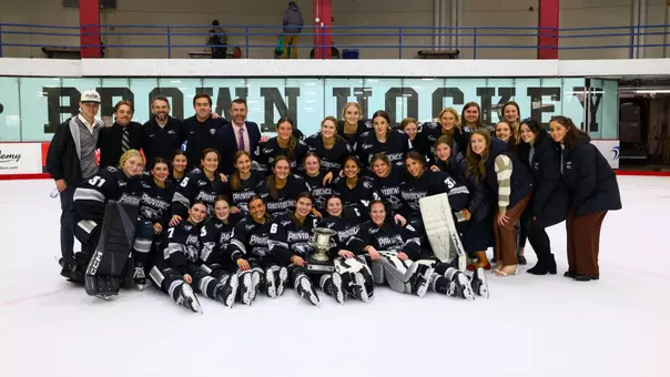 The Providence College women's ice hockey team with the Mayor's Cup trophy after defeating Brown University