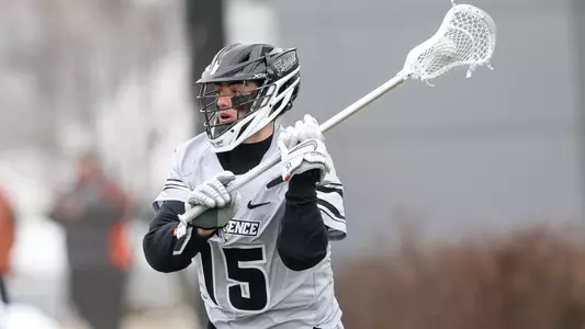 Ryan Bell passing the ball versus Harvard.