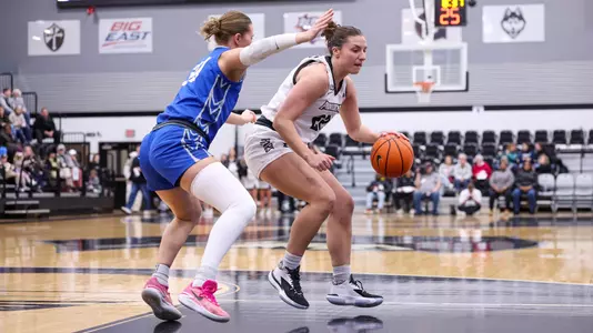 Brynn Farrell - women's basketball action photo vs. Creighton