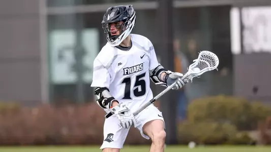 Ryan Bell with the ball on attack versus Holy Cross.