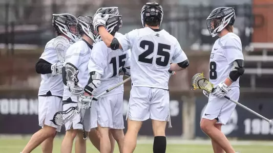 Lacrosse Team Celebration after scoring a goal