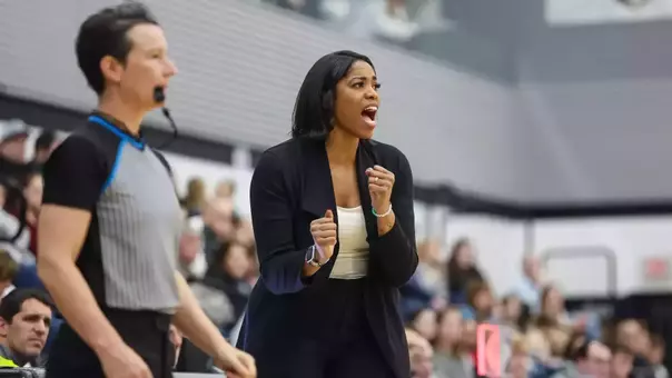 Head women's basketball coach Erin Batth coaching during a Big East conference matchup between Marquette and Providence College at Alumni Hall.