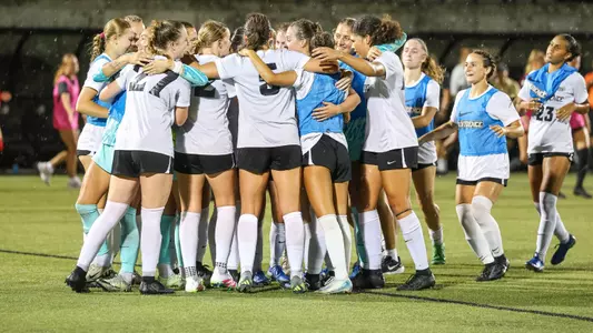 Women's soccer huddle celebration versus Army at Chapey Field at Anderson Stadium on August 14, 2025