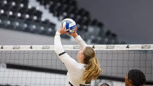 Audrey Kocon Setting the Ball in the 2025 volleyball season against Bryant University at Alumni Hall in Providence, Rhode Island
