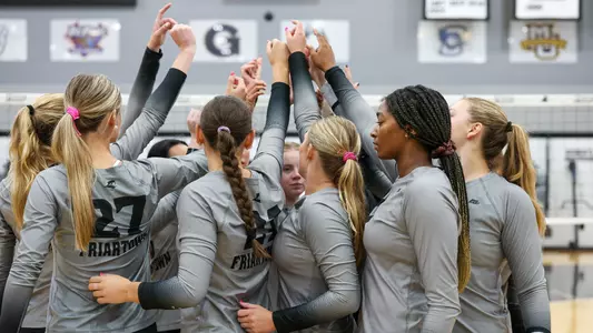 Volleyball Team Huddle at Alumni Hall in Providence, R.I. in the 2025 season against Brown University.