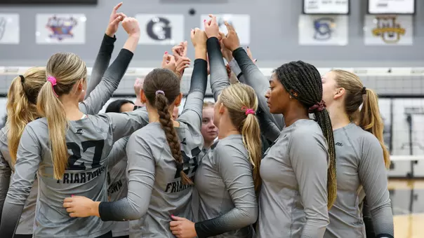 Volleyball Team Huddle at Alumni Hall in Providence, R.I. in the 2025 season against Brown University.