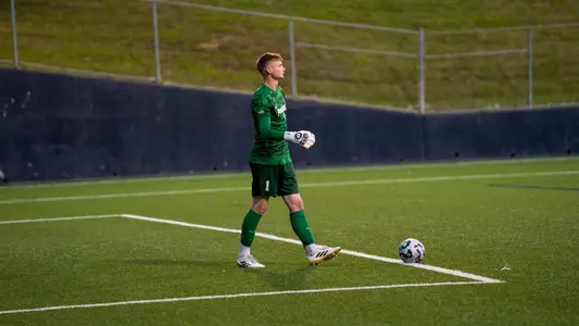 Ryan Carney prepares for goal kick against Xavier in Cincinnati, Ohio