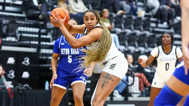 Nalani Kaysia holds the basketball while looking to pass to a teammate during a game vs. Seton Hall