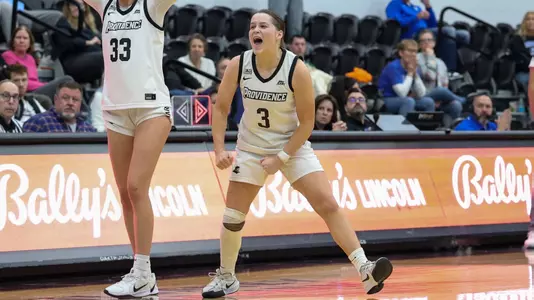 Orlagh Gormley celebrates on the court after a victory against Creighton