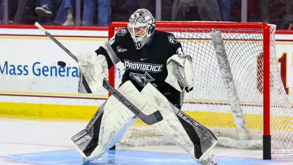Men's Hockey Jack Parsons Makes a save during warmups at Boston College