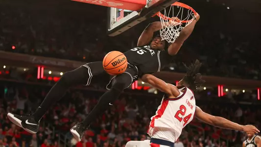 Oswin Erhunmwunse dunks the ball at Madison Square Garden versus St. John's.