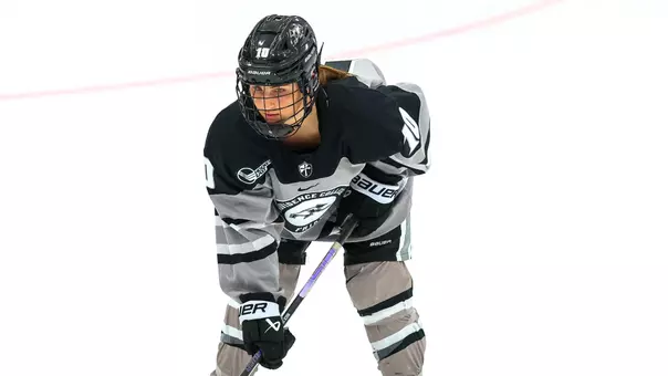 Women's ice hockey player Lauren Mack waiting for the puck to be dropped