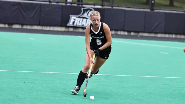 Saar Koper with the ball in game action against Holy Cross