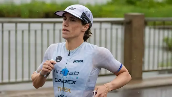 Former women's cross country and track runner Grace Thek running in an Ironman