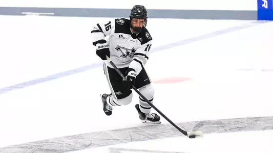 Men's Hockey's Jonathan Fauchon in action against St. Lawrence