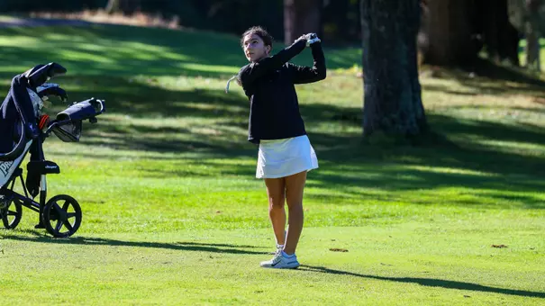 Women's golfer Olivia Arone hitting a golf shot