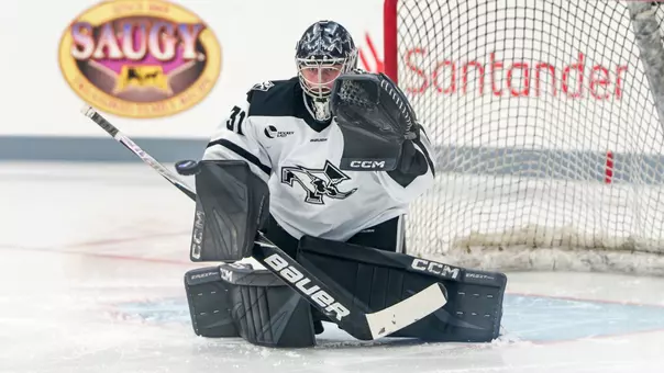 Mallory Hartl saving goal on ice
