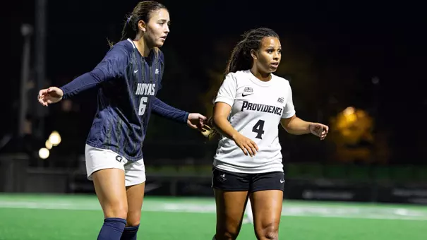 Amaya Coffie standing next to Georgetown girl