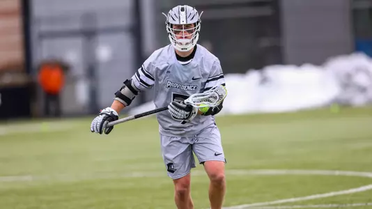 Rhett Chambers with the ball on Chapey Field at Anderson Stadium