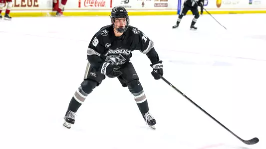 Men's Hockey's Tanner Adams in action in a game at Boston College.