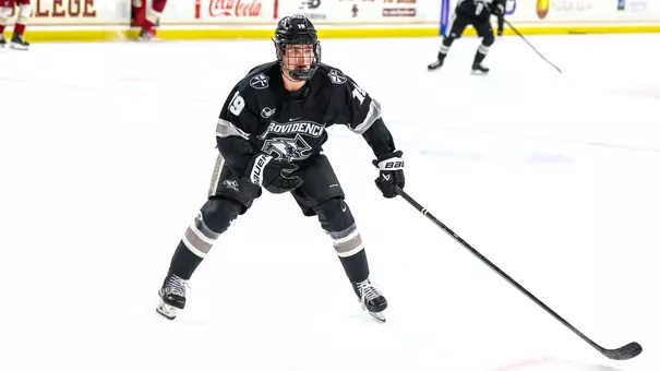 Men's Hockey's Tanner Adams in action in a game at Boston College.