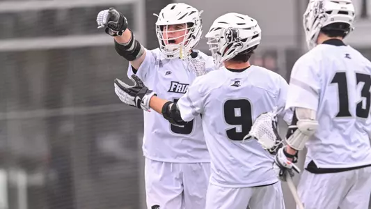 Rhett Chambers points at crowd in celebration versus Bryant on Chapey Field at Anderson Stadium.
