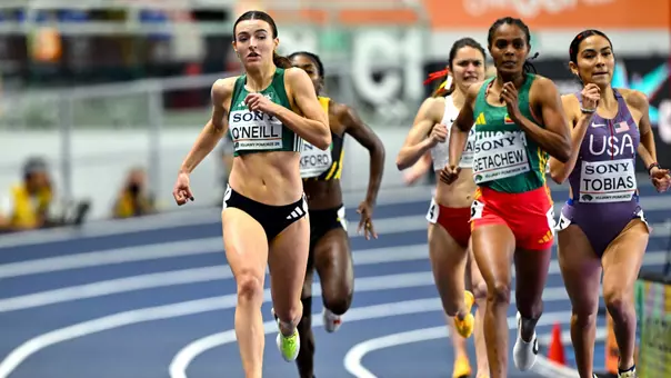 Women's track runner Maeve O'Neill running at the World Indoor Championships in Kujawy Pomorze, Poland