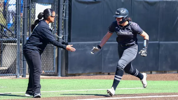 Sofia Peterson rounds the bases during a Big East conference matchup between Depaul and Providence held at Glay Field. Photo by Brian Foley for Foley Photography