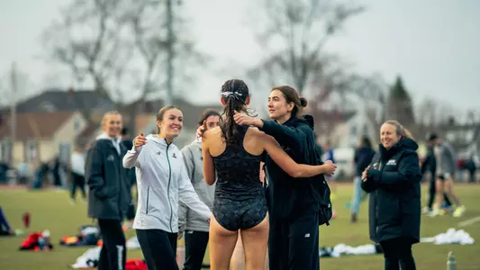 Ciara Evans with teammates after racing the mile