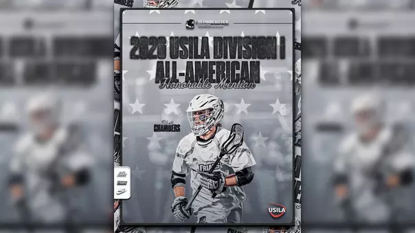 A graphic featuring men's lacrosse player Rhett Chambers in a white uniform cradling the ball in his stick to announce that he earned USILA All-America Honors. The text on the graphic reads 2026 USILA Division I All-American Honorable Mention; Rhett Chambers.