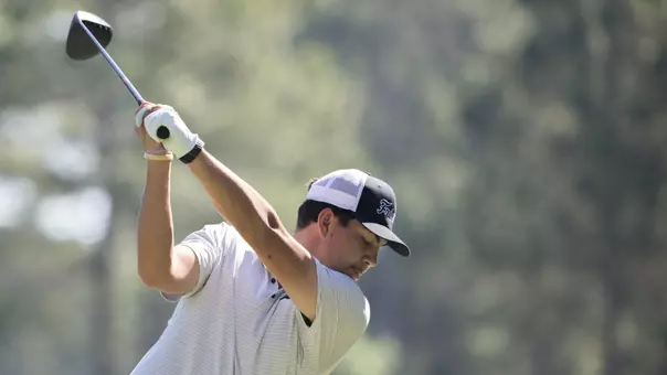 Men's golf player Campbell Skelly hitting a tee shot at the BIG EAST Championships