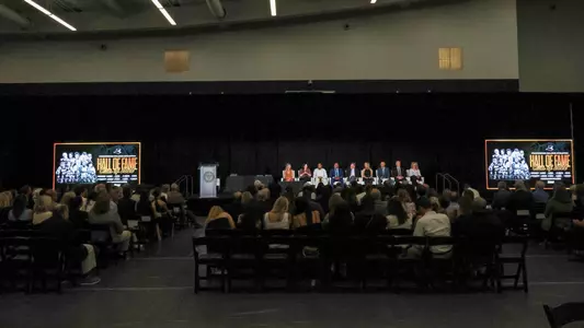 A wide shot of all the inductees in the 2026 Providence College Hall of Fame during a question and answer
