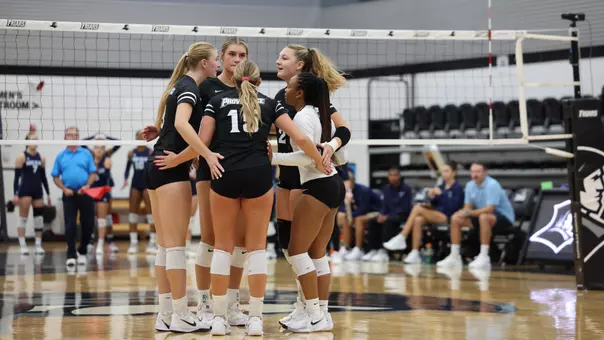 Volleyball in a huddle during a match