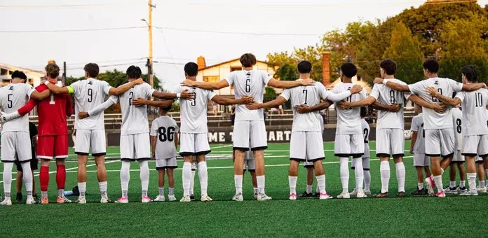 Mens soccer team lining up pregame