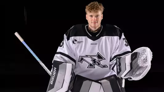 Aaron Matthews Men's Hockey in ready position